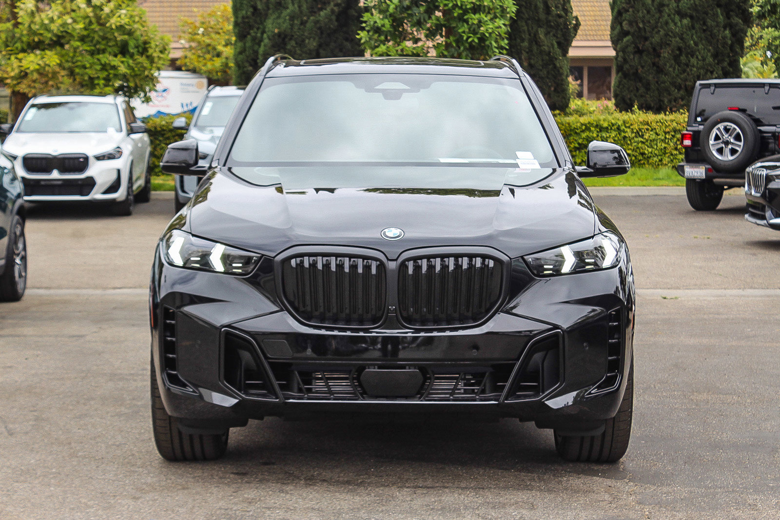 New 2026 Black Sapphire Metallic BMW sDrive40i image 2