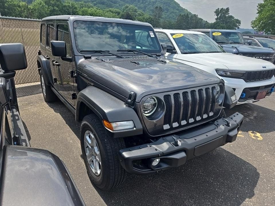 Used 2021 Jeep Wrangler Unlimited Freedom with VIN 1C4HJXDN3MW762675 for sale in Kansas City