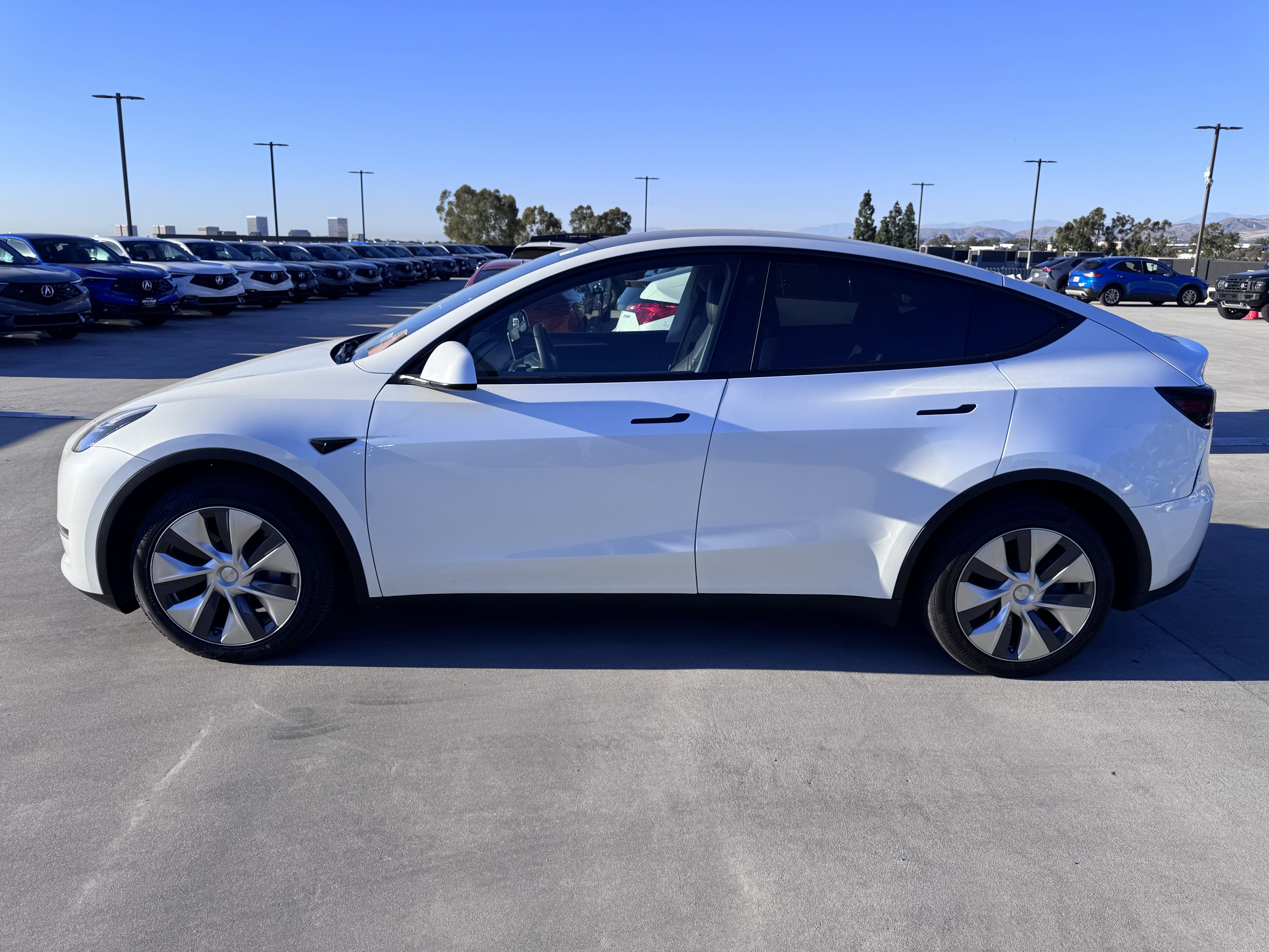 Used 2023 Tesla Model Y Long Range with VIN 7SAYGDEE8PA122451 for sale in Kansas City