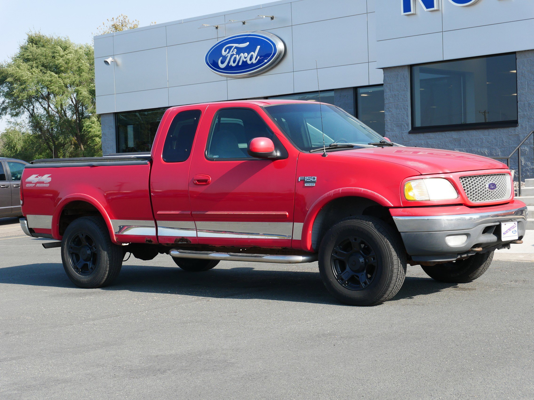 Used 1999 Ford F-150 LARIAT with VIN 1FTRX18L3XKA37503 for sale in Northfield, Minnesota