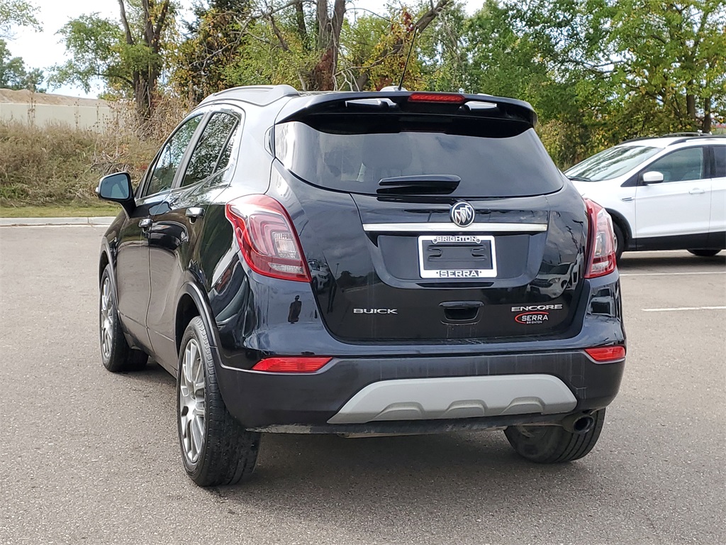 Used 2018 Buick Encore Sport Touring with VIN KL4CJ1SM9JB590246 for sale in Brighton, MI