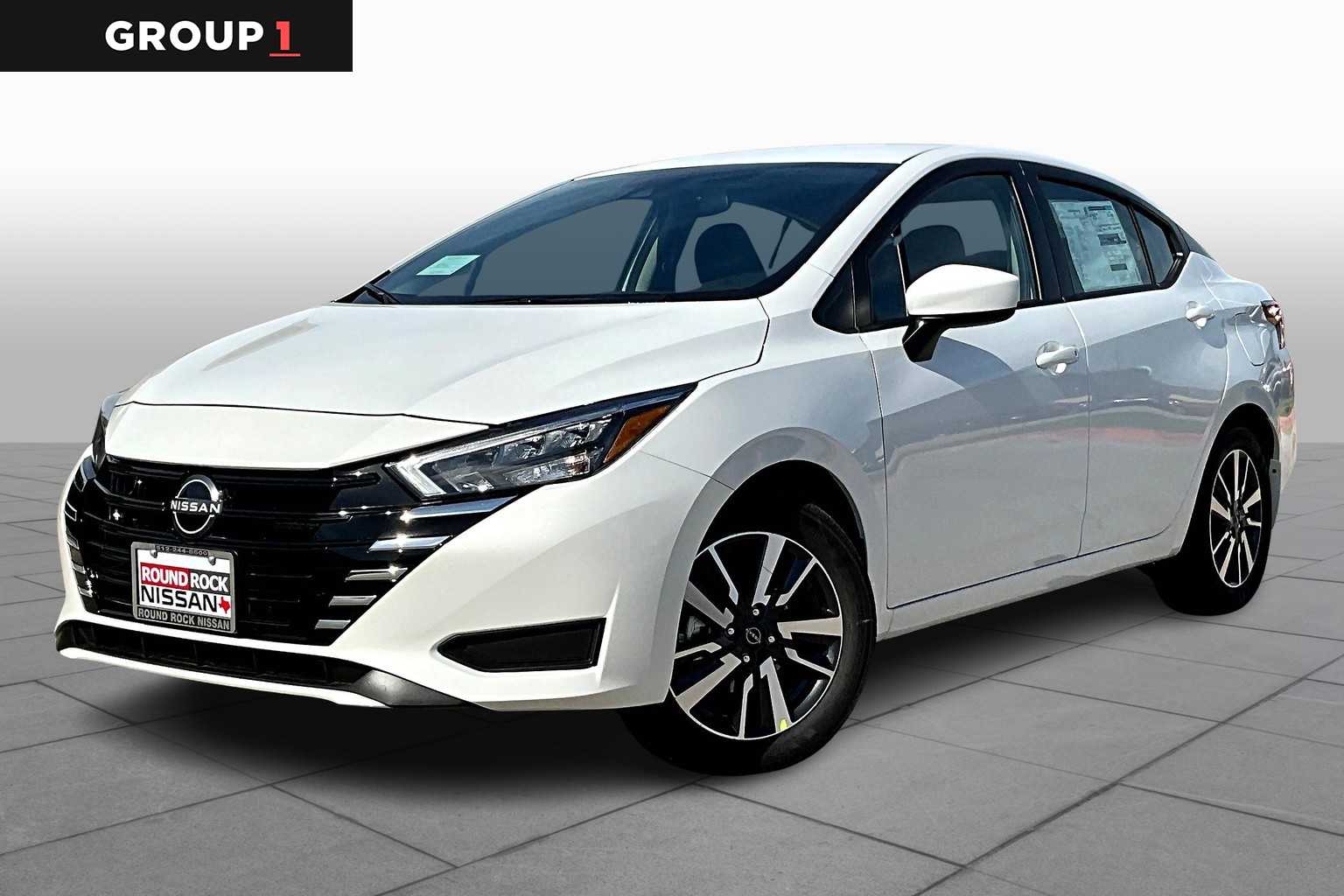 Smith Family Car Store Inc. - 2011 Nissan Versa 1.8 SL 4dr Hatchback, image size:1536x1024