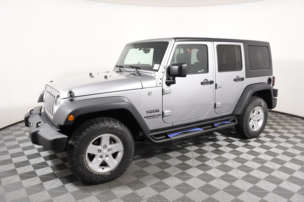 Used 2017 Jeep Wrangler Unlimited Sport S with VIN 1C4BJWDG8HL710080 for sale in Richfield, Minnesota
