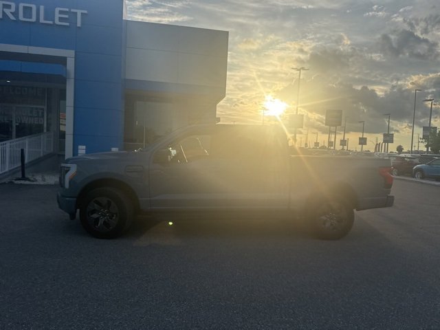 Used 2023 Ford F-150 Lightning XLT with VIN 1FTVW1ELXPWG33075 for sale in Tampa, FL