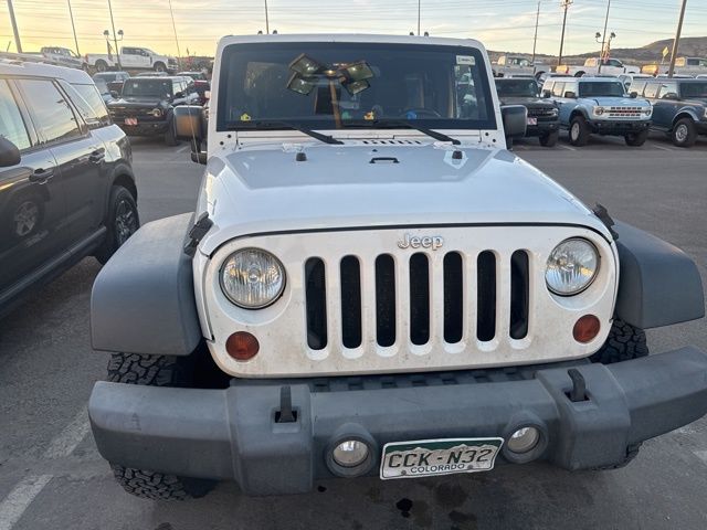 Used 2012 Jeep Wrangler Unlimited Sport with VIN 1C4BJWDG5CL238090 for sale in Castle Rock, CO