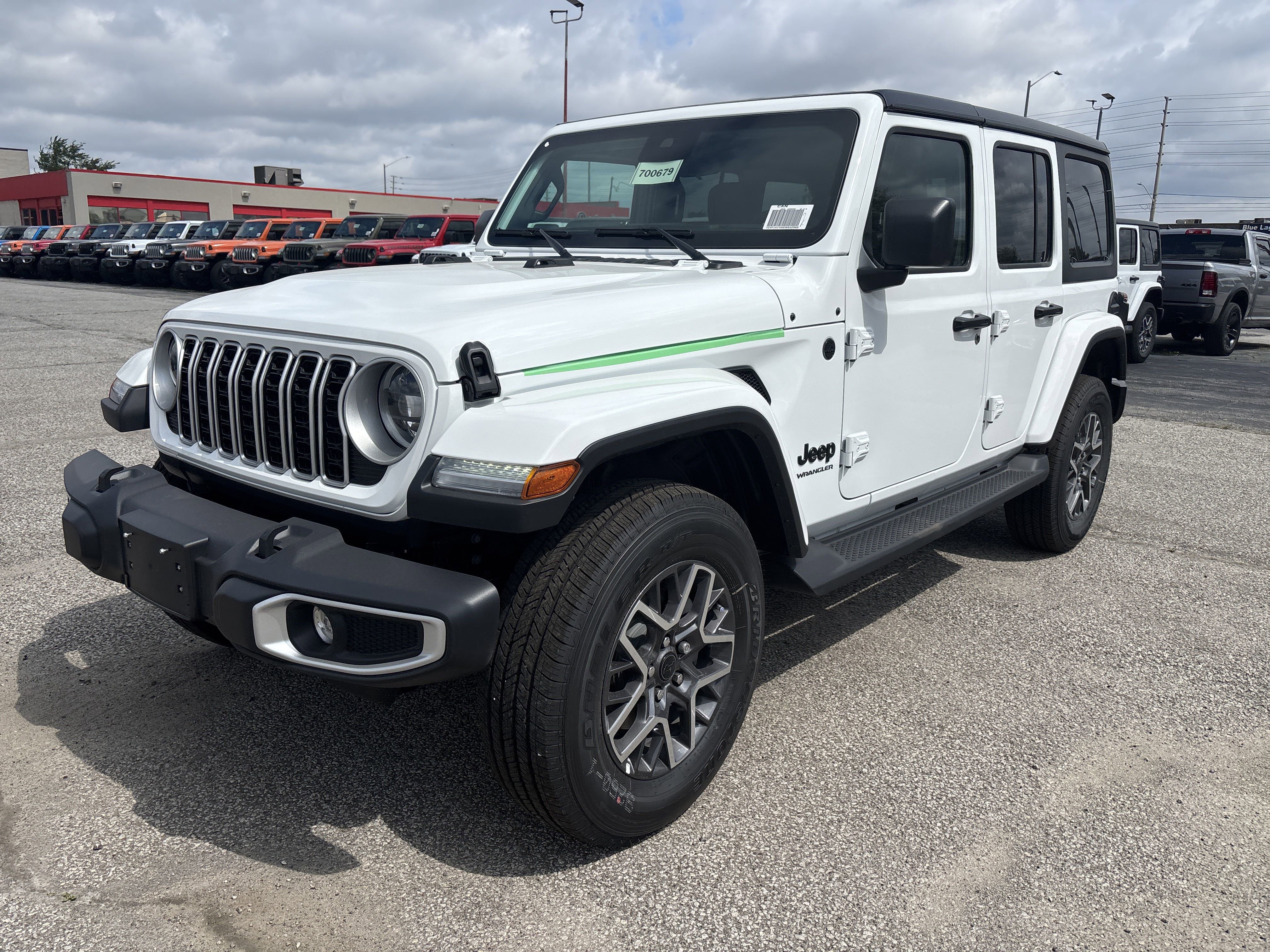 New 2025 Bright White Jeep Sahara image 1