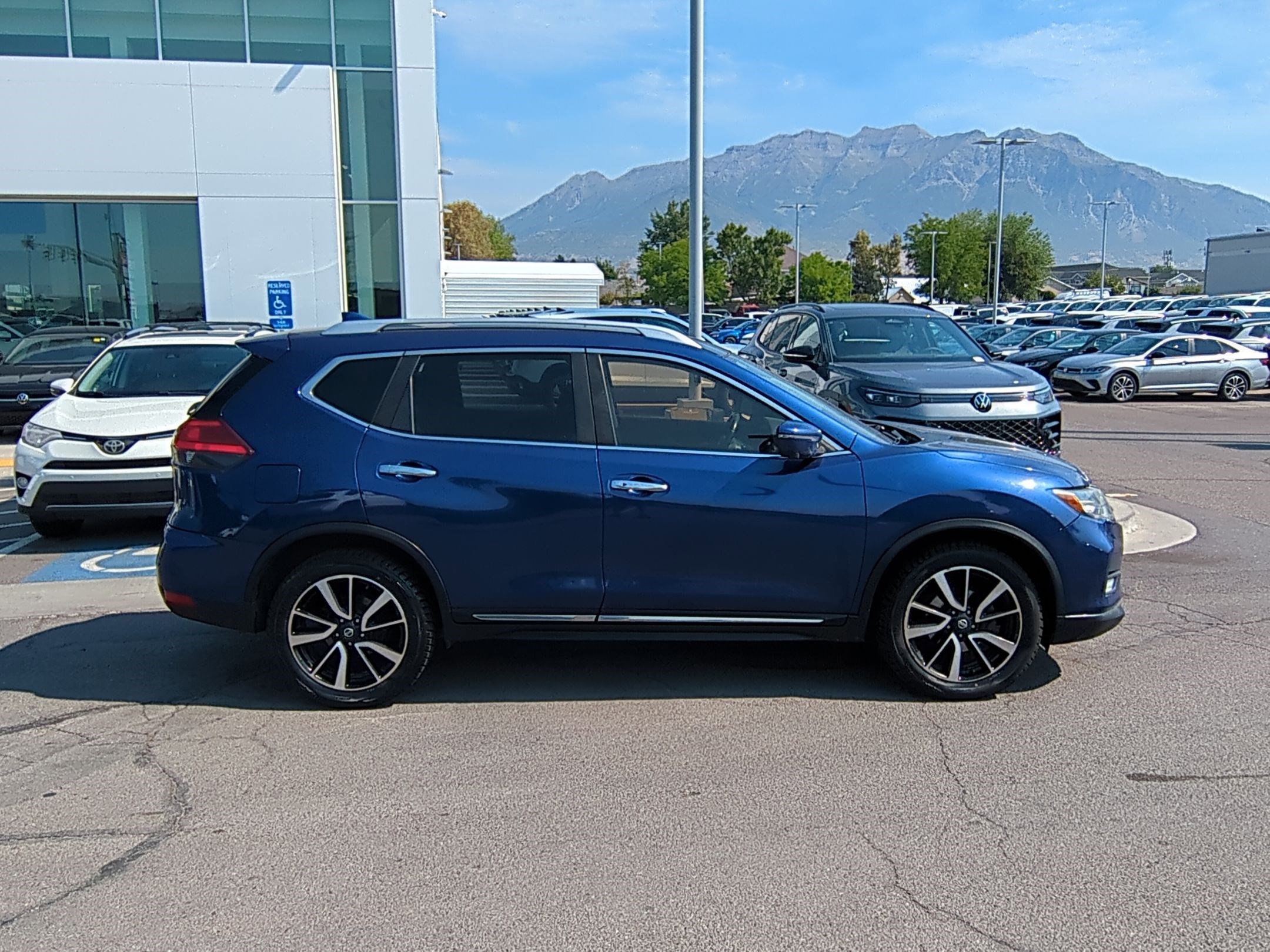 Used 2017 Nissan Rogue SL with VIN JN8AT2MVXHW008696 for sale in Orem, UT