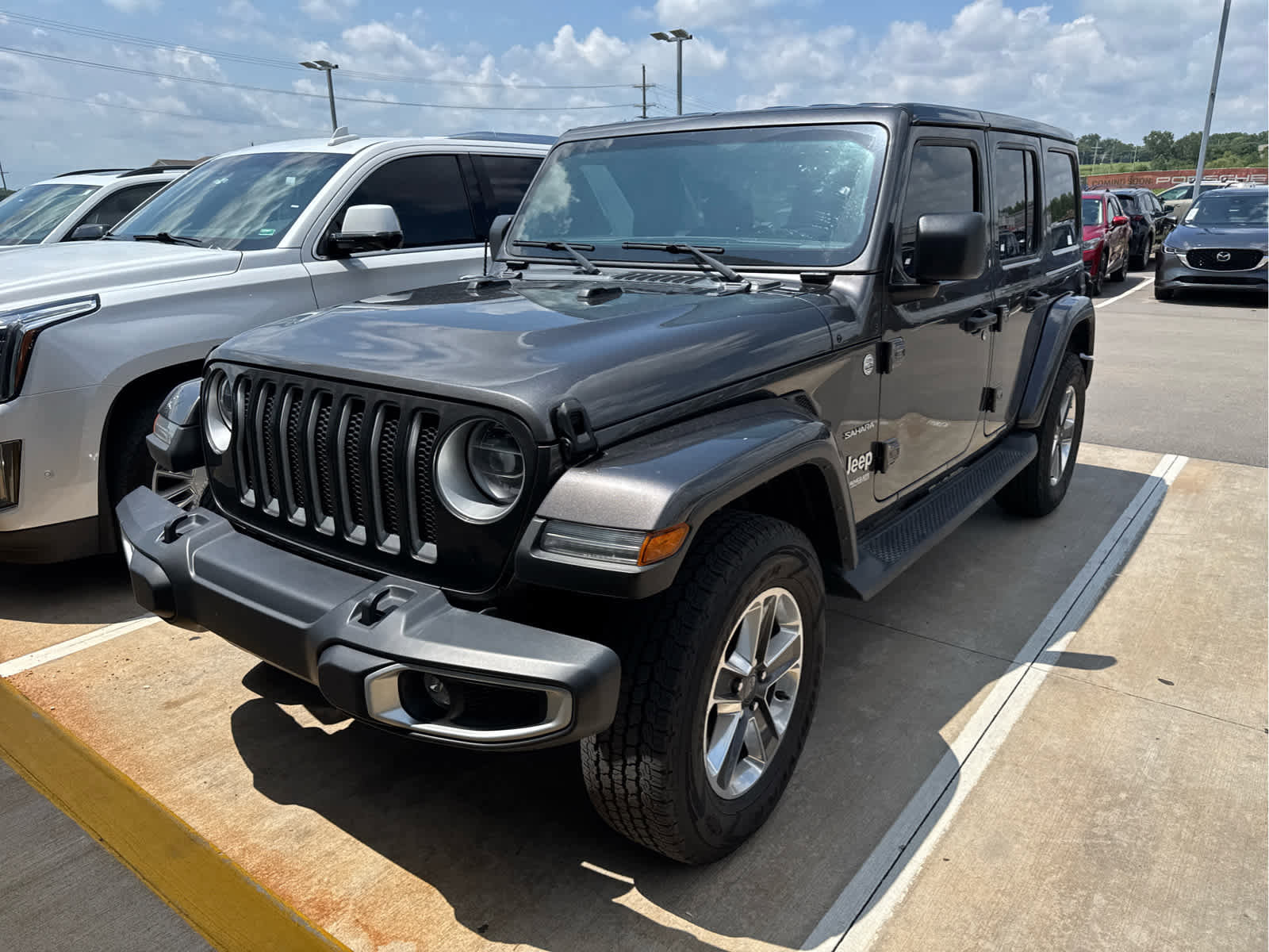 Used 2022 Jeep Wrangler Unlimited Sahara with VIN 1C4HJXEG0NW191695 for sale in Kansas City