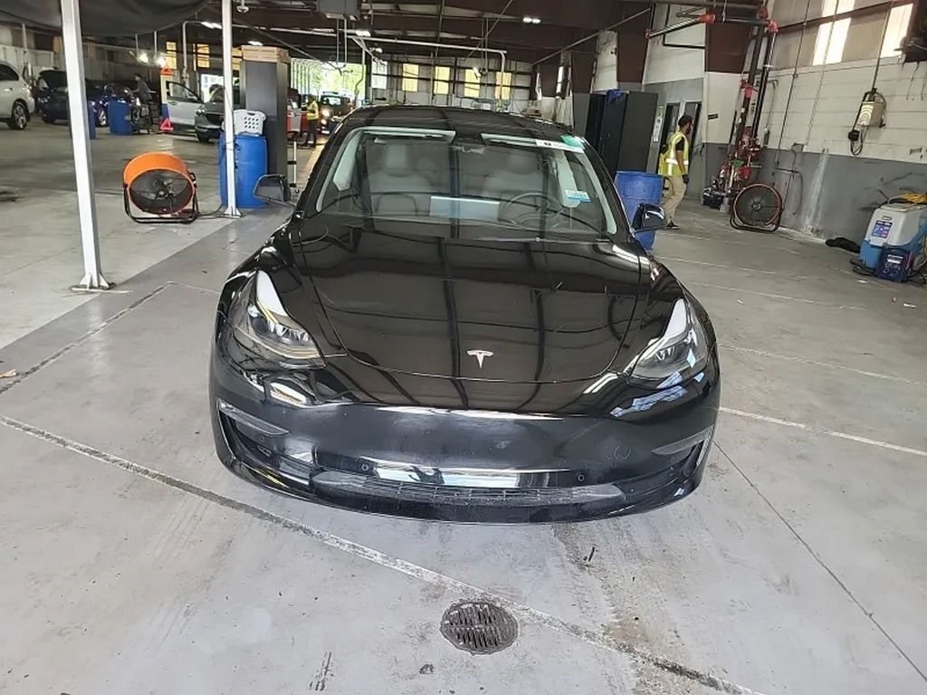 Used 2022 Tesla Model 3 Long Range with VIN 5YJ3E1EB9NF257021 for sale in Miami, FL