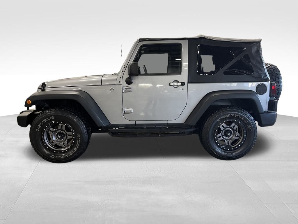 Used 2015 Jeep Wrangler Sport with VIN 1C4AJWAG2FL500586 for sale in Northfield, Minnesota