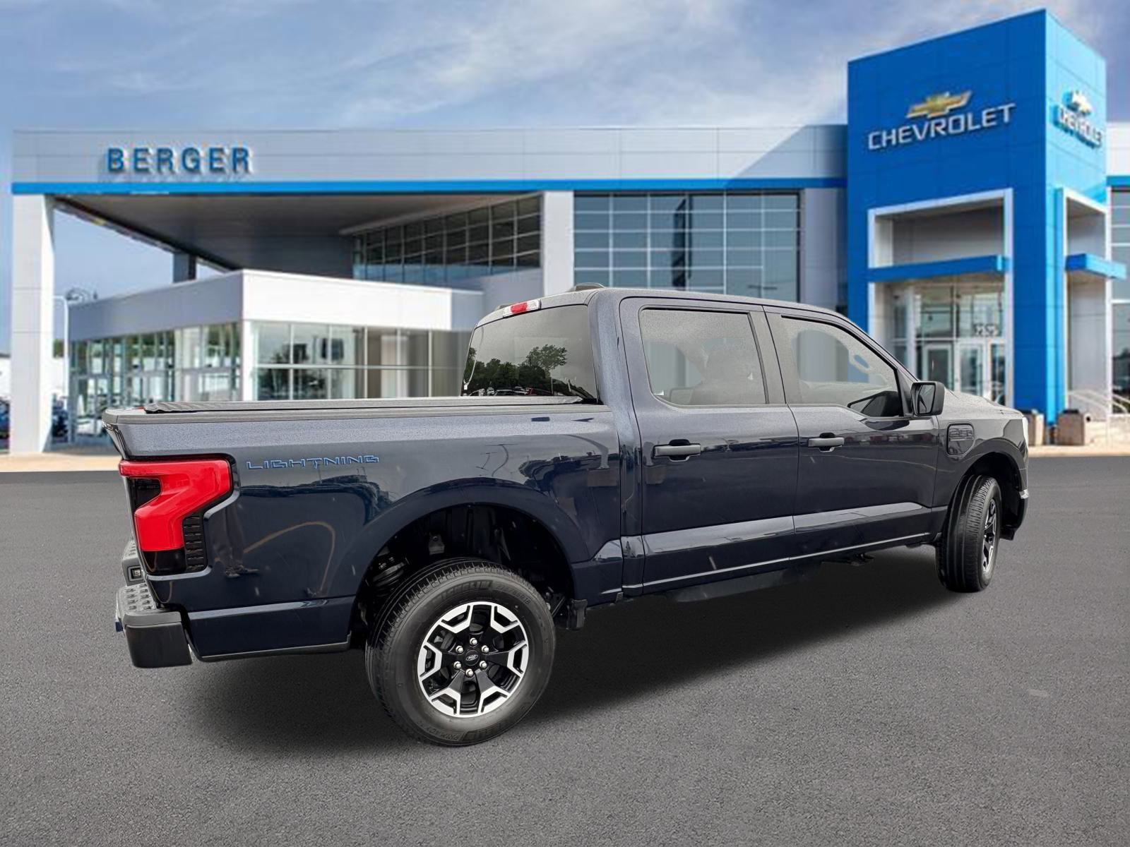 Used 2022 Ford F-150 Lightning Pro with VIN 1FTVW1EL0NWG05881 for sale in Grand Rapids, MI
