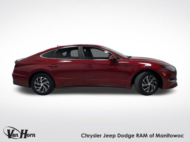 Used 2023 Hyundai Sonata Hybrid Blue with VIN KMHL24JJ7PA083318 for sale in Manitowoc, WI