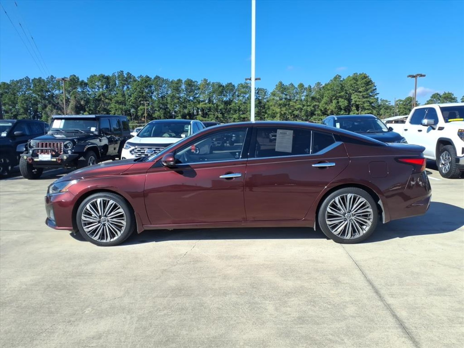 2023 Nissan Altima 2.5 SL Red at Robbins Nissan
