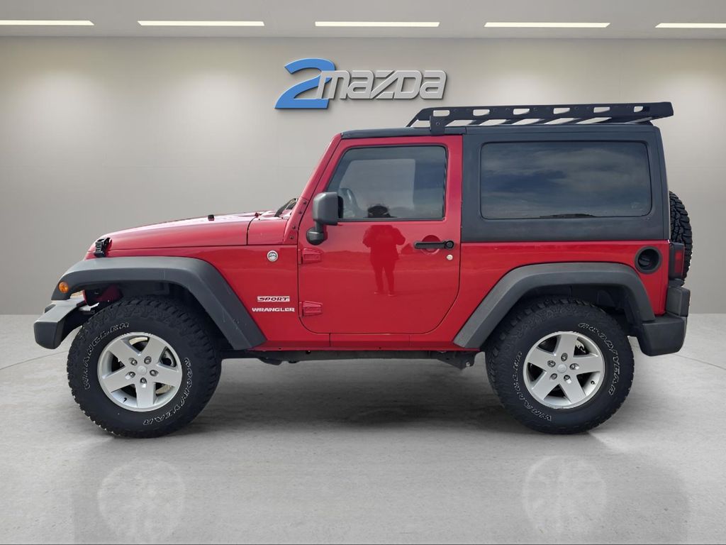 Used 2011 Jeep Wrangler Sport with VIN 1J4AA2D16BL594315 for sale in Santa Fe, NM