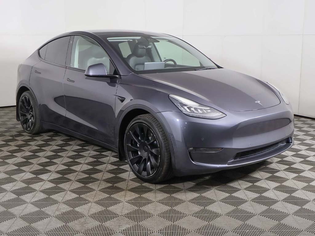 Used 2021 Tesla Model Y Standard Range with VIN 5YJYGDED7MF118149 for sale in Parma, OH