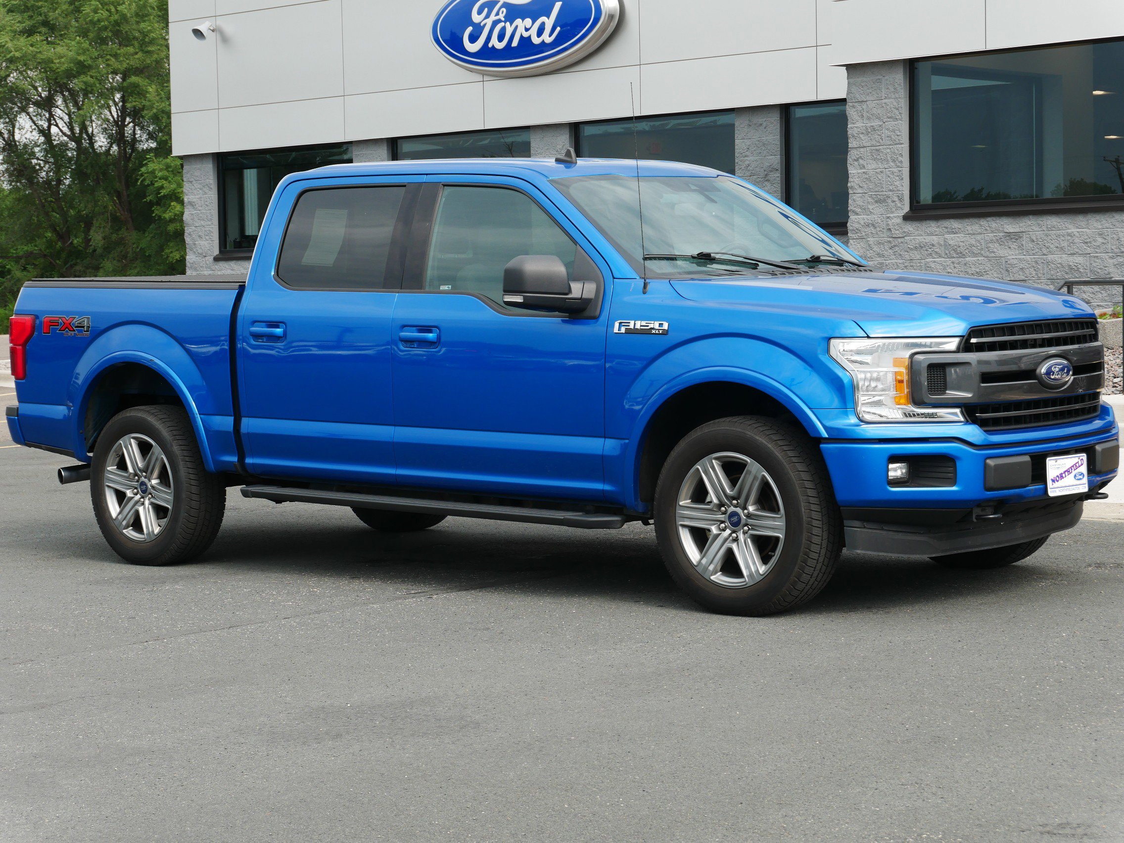 Used 2019 Ford F-150 XLT with VIN 1FTEW1E47KFA76031 for sale in Northfield, Minnesota
