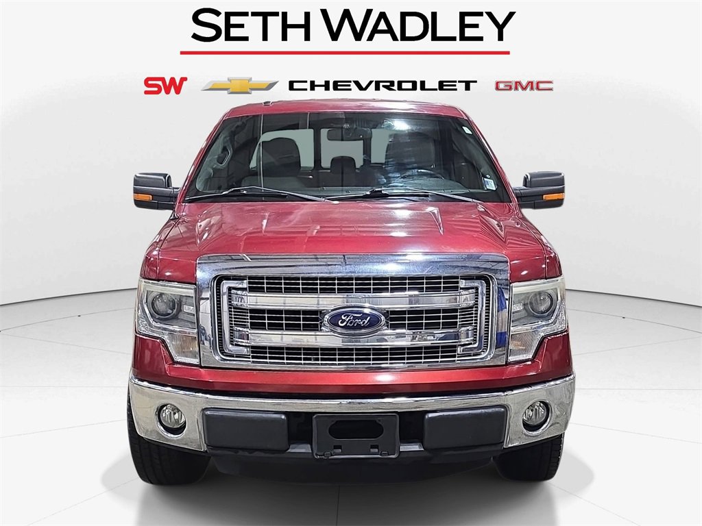 Used 2014 Ford F-150 XLT with VIN 1FTFW1CF7EKG47117 for sale in Perry, OK