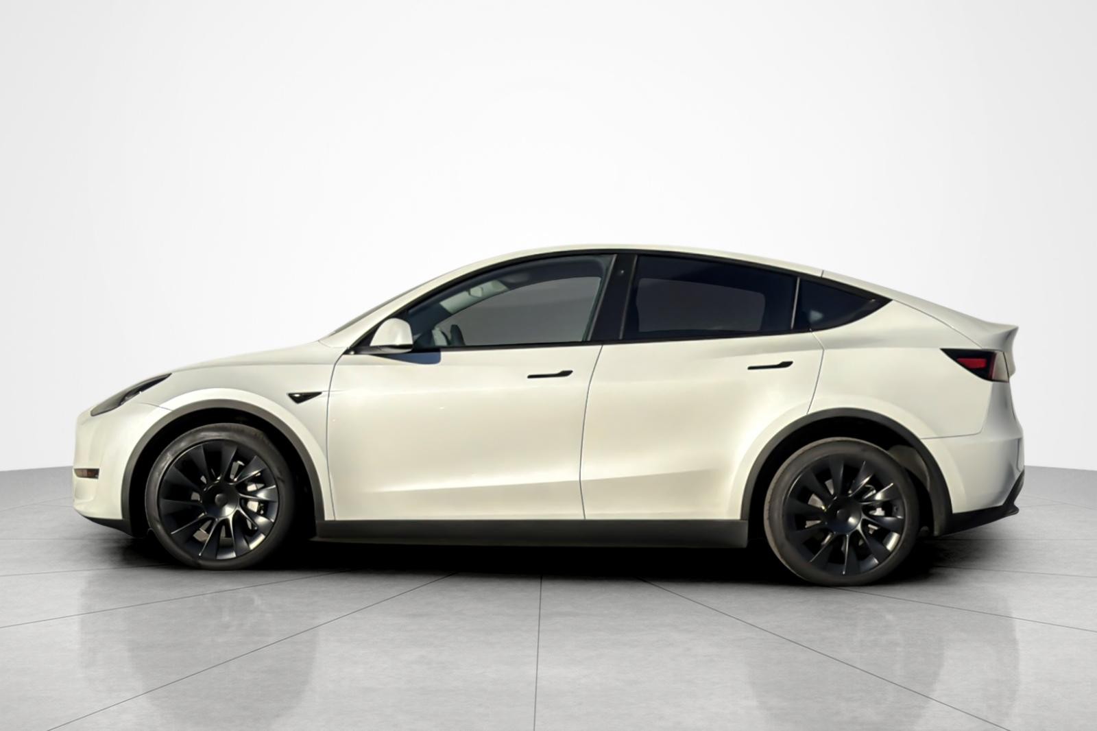 Used 2023 Tesla Model Y Long Range with VIN 7SAYGDEE3PA081050 for sale in Kansas City