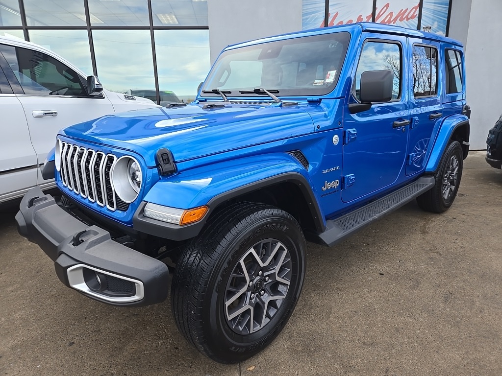 Used 2024 Jeep Wrangler 4-Door Sahara with VIN 1C4PJXEG2RW335717 for sale in Kansas City