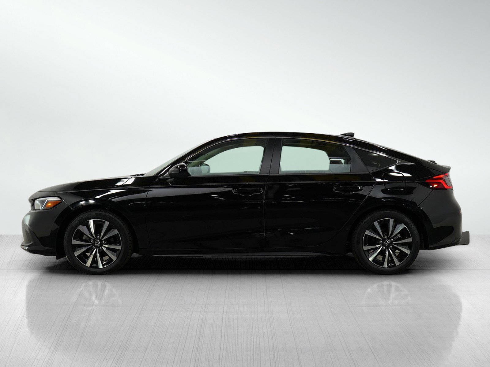 Used 2024 Honda Civic Hatchback EX-L with VIN 19XFL1H76RE001599 for sale in Burnsville, Minnesota