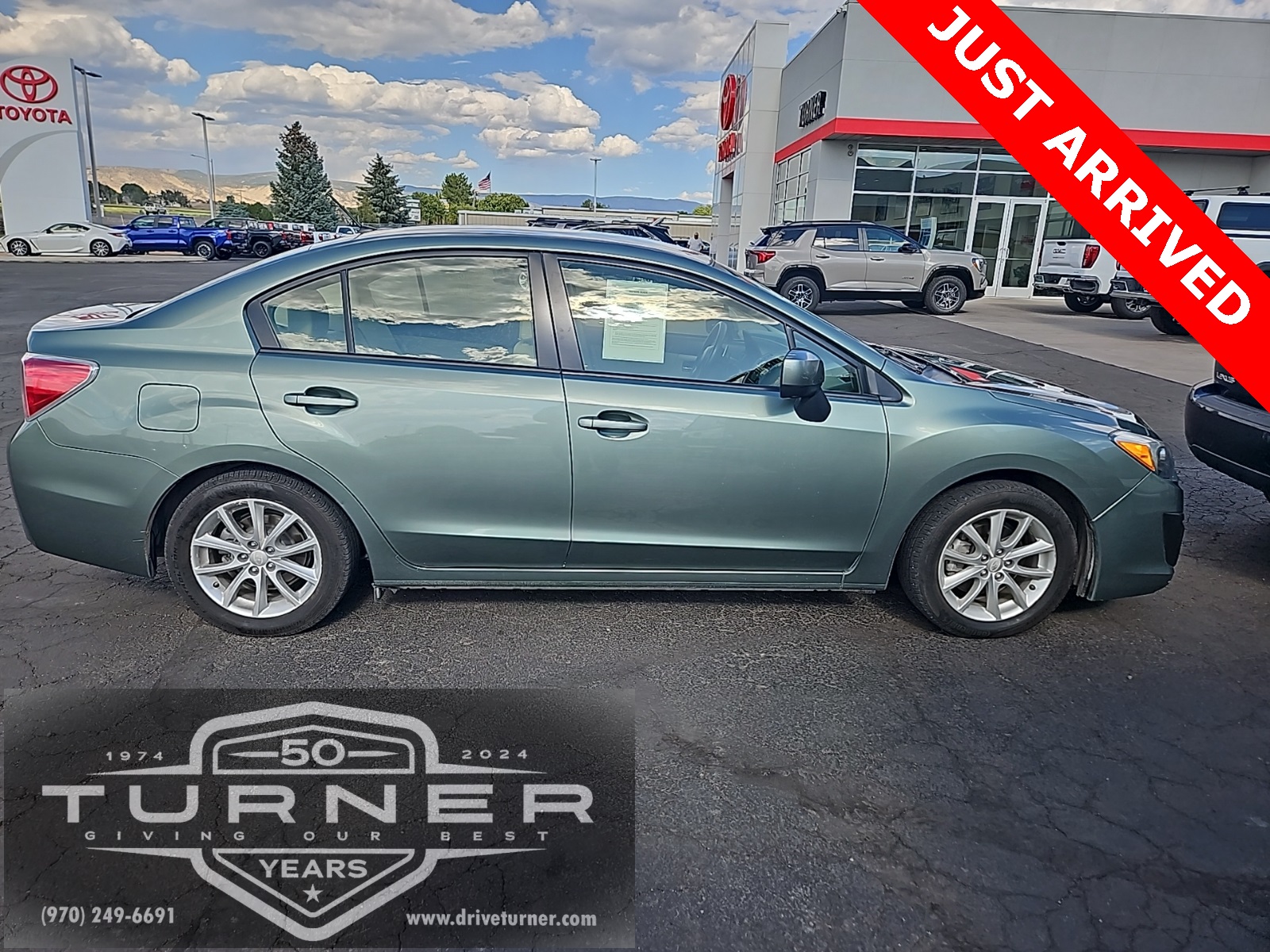 Used 2014 Subaru Impreza 2.0I Premium with VIN JF1GJAC60EH008860 for sale in Montrose, CO