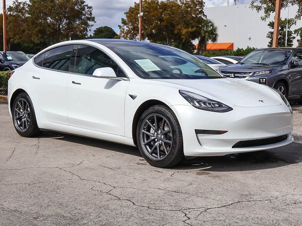 Used 2019 Tesla Model 3 Base with VIN 5YJ3E1EA3KF417817 for sale in Miami, FL