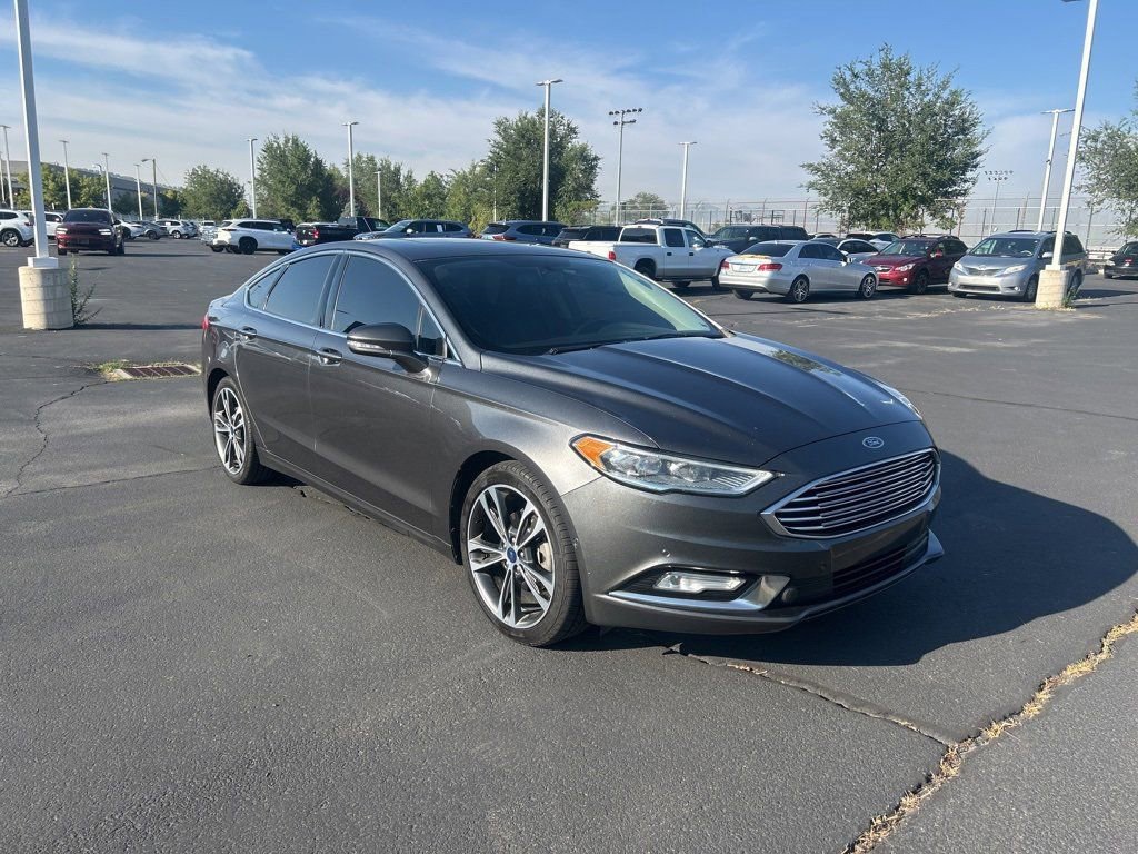 Used 2017 Ford Fusion Titanium with VIN 3FA6P0D97HR100919 for sale in Bountiful, UT