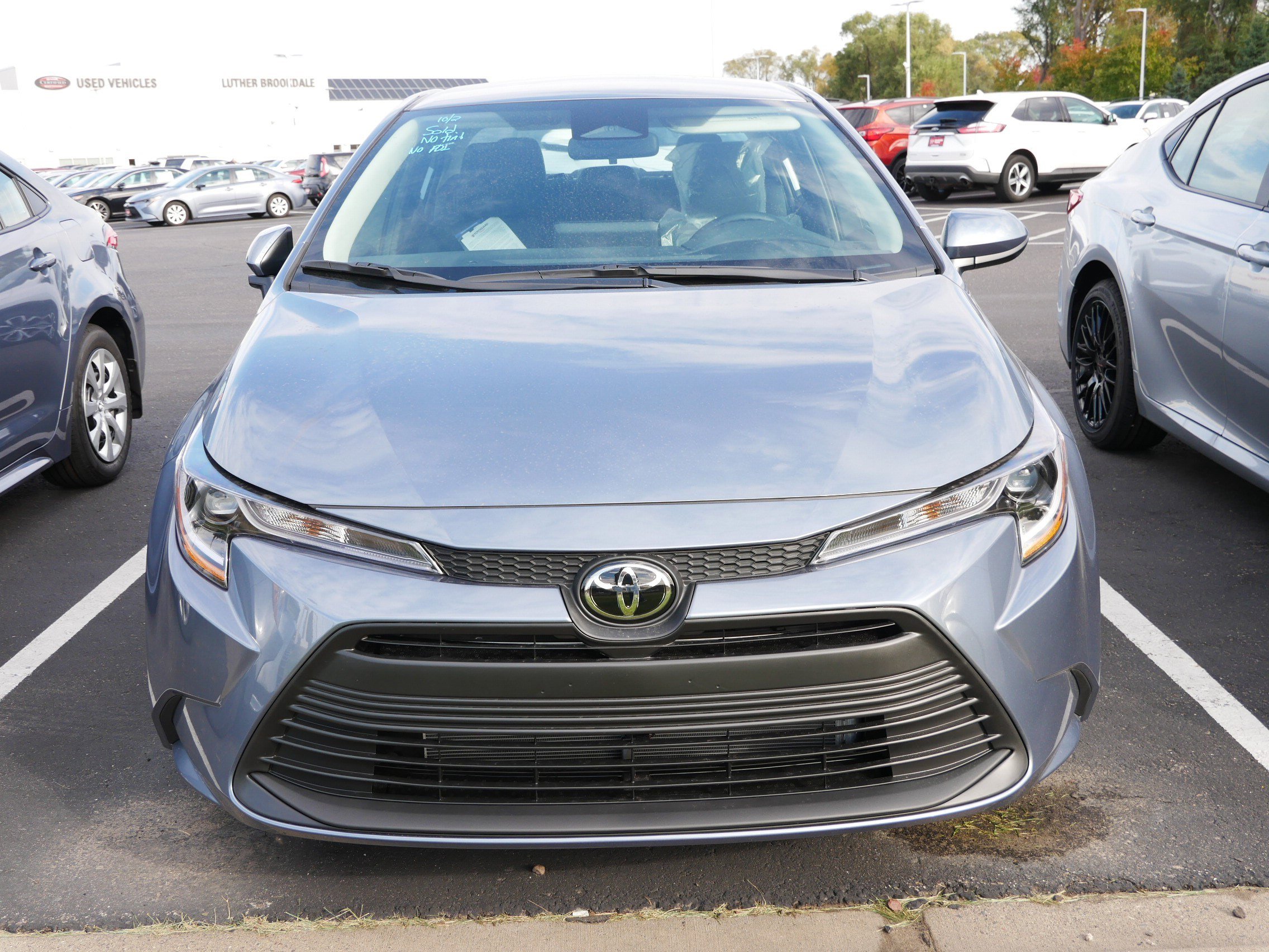 Used 2026 Toyota Corolla LE with VIN 5YFB4MDE1TP366005 for sale in Brooklyn Center, Minnesota