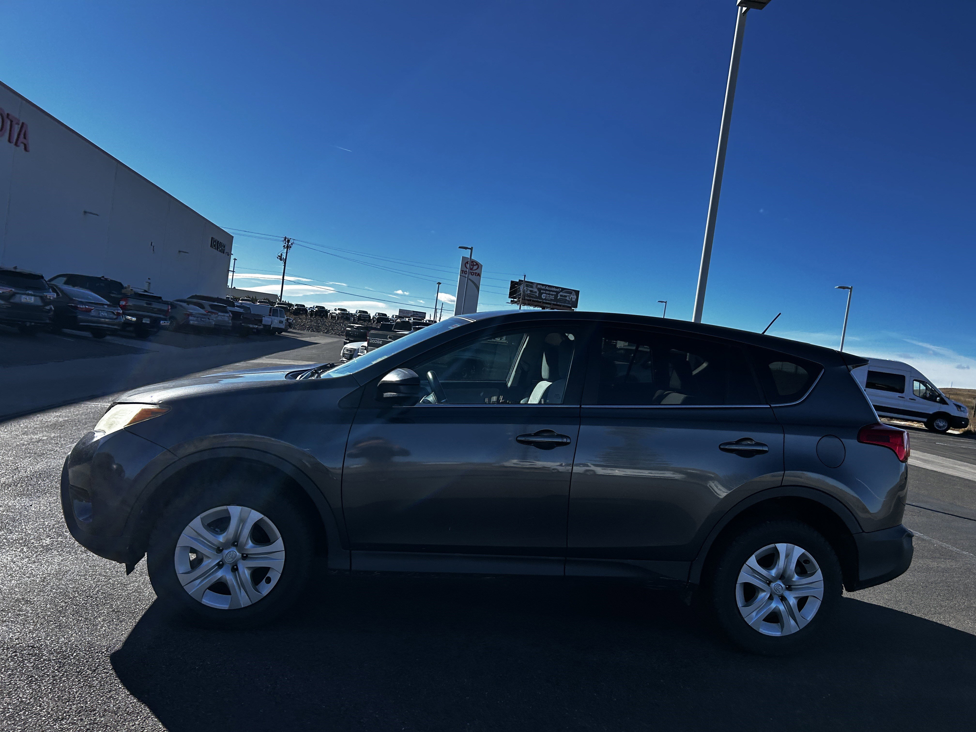 Used 2015 Toyota RAV4 LE with VIN 2T3BFREVXFW287030 for sale in Cheyenne, WY