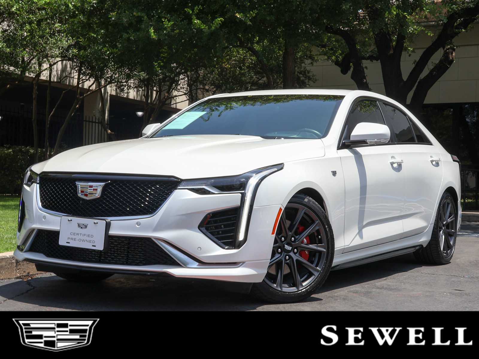 Certified Used 2024 Crystal White Tricoat Cadillac Sport image 1