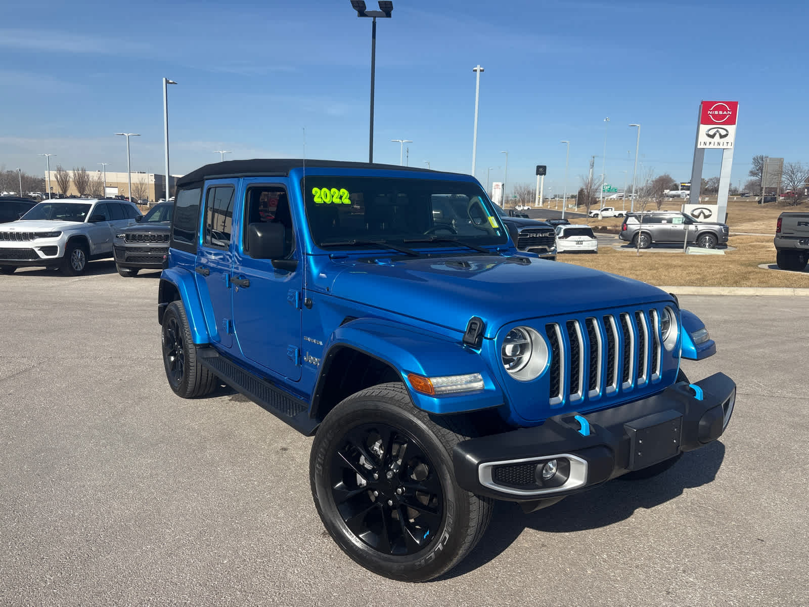 Used 2022 Jeep Wrangler Unlimited Sahara 4XE with VIN 1C4JJXP63NW279372 for sale in Kansas City