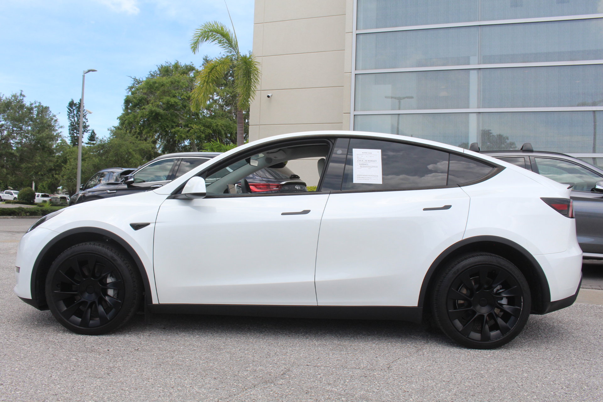 Used 2023 Tesla Model Y Long Range with VIN 7SAYGDEE7PF838602 for sale in Clearwater, FL