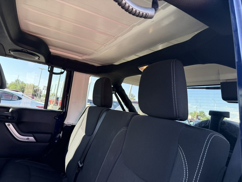 Used 2013 Blue Jeep Unlimited Sahara image 8