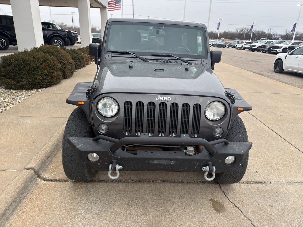 Used 2014 Jeep Wrangler Unlimited Sahara with VIN 1C4BJWEG8EL167730 for sale in Manhattan, KS