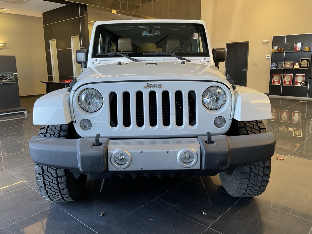 Used 2015 Jeep Wrangler Unlimited Sahara with VIN 1C4BJWEG9FL697853 for sale in Kansas City