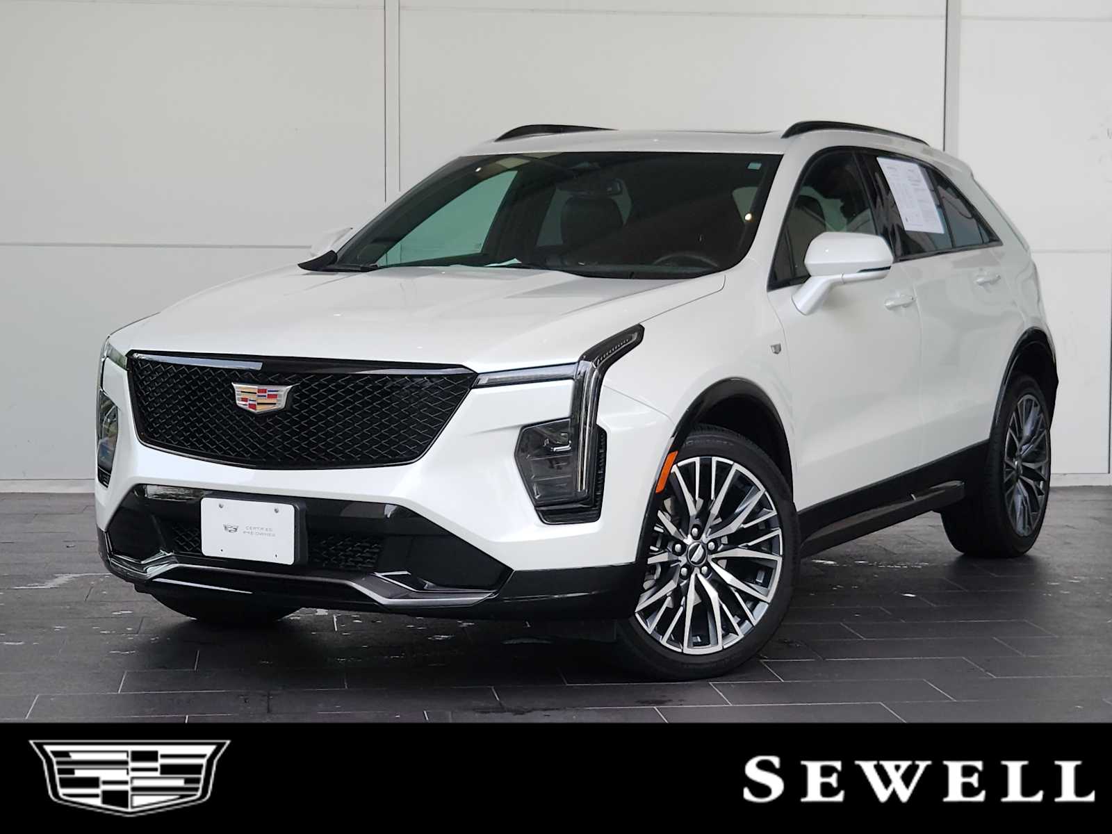 Certified Used 2024 Crystal White Tricoat Cadillac Sport image 1