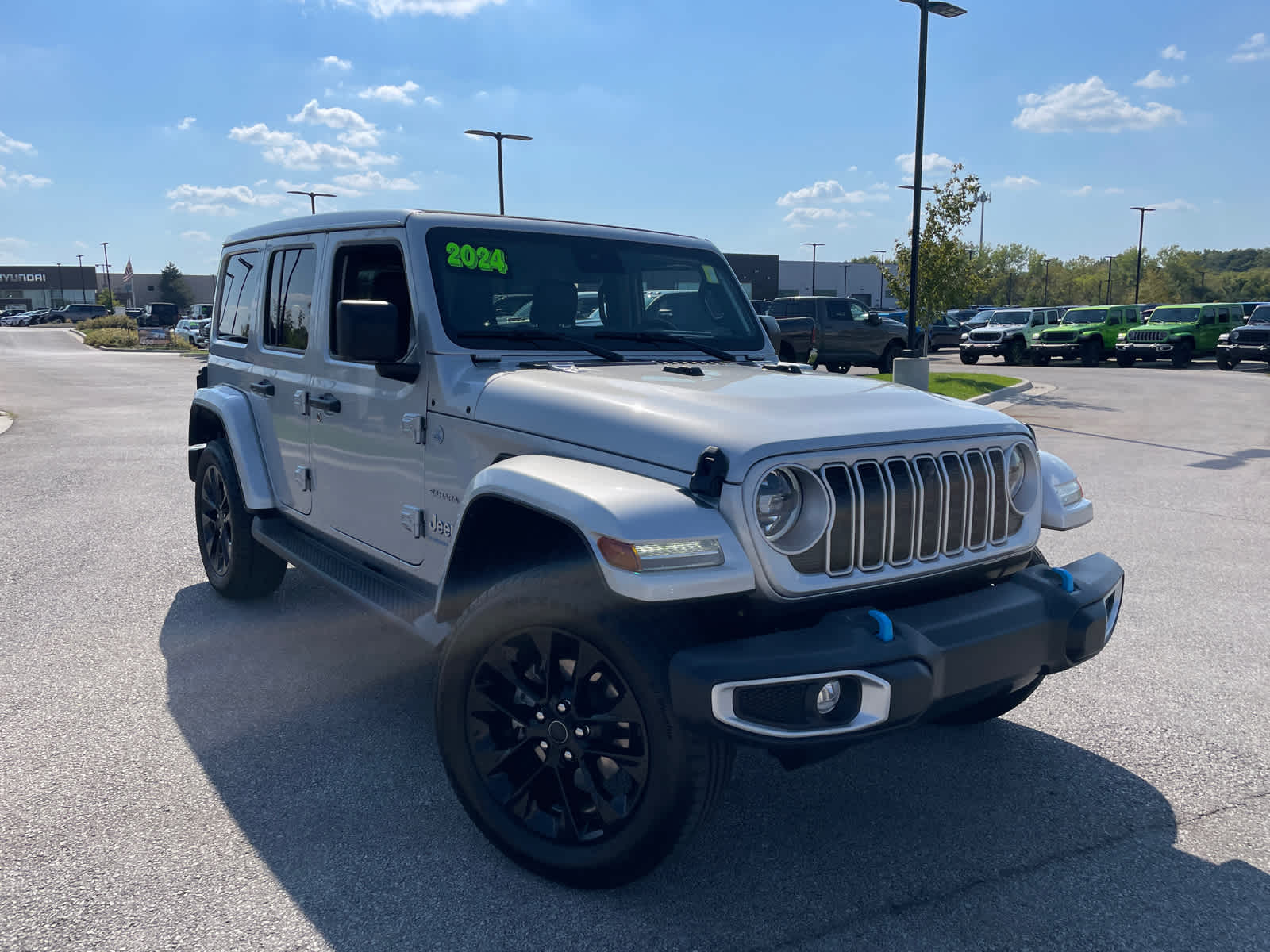 Used 2024 Jeep Wrangler 4xe Sahara 4XE with VIN 1C4RJXP69RW164087 for sale in Kansas City