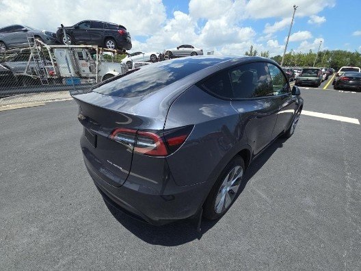 Used 2023 Tesla Model Y Long Range with VIN 7SAYGDEE5PF977045 for sale in Northfield, Minnesota