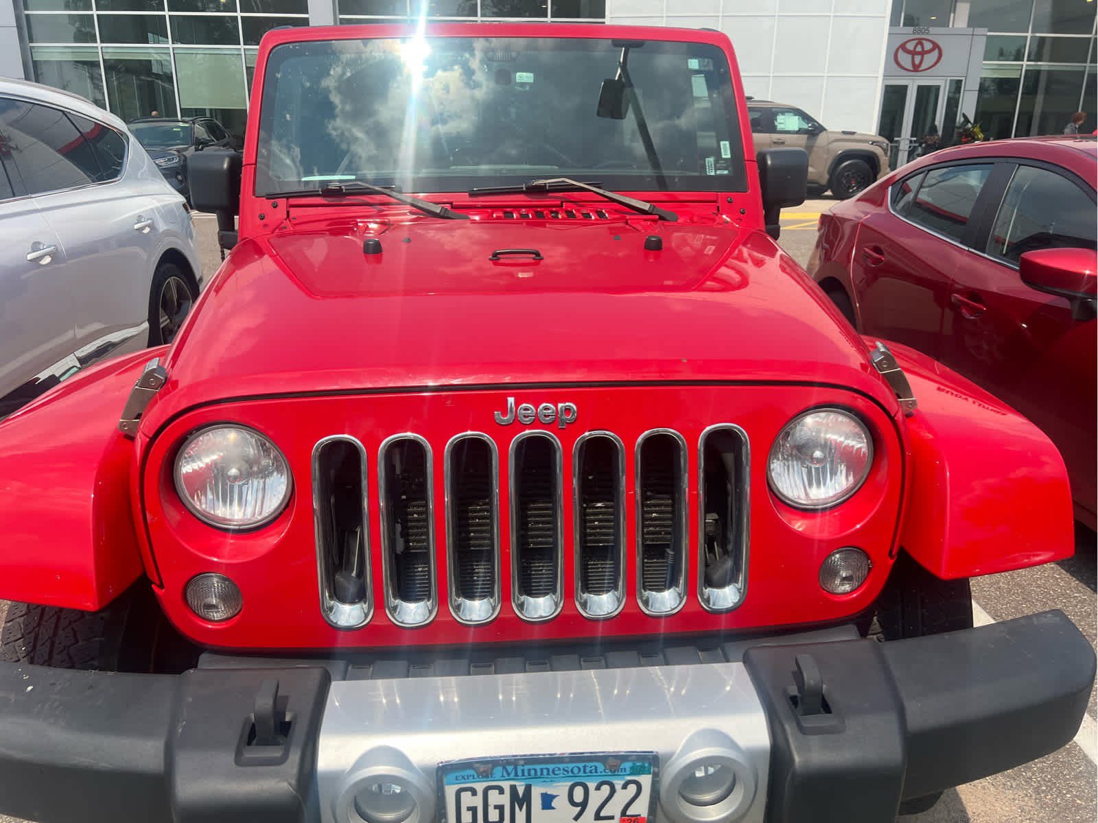 Used 2014 Jeep Wrangler Unlimited Sahara with VIN 1C4BJWEG4EL129007 for sale in Golden Valley, MN