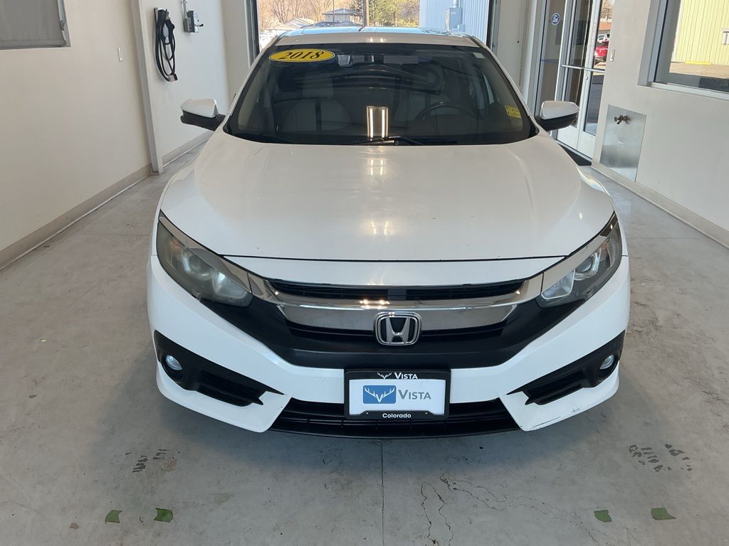 Used 2018 Honda Civic EX-T with VIN JHMFC1F34JX002284 for sale in Delta, CO