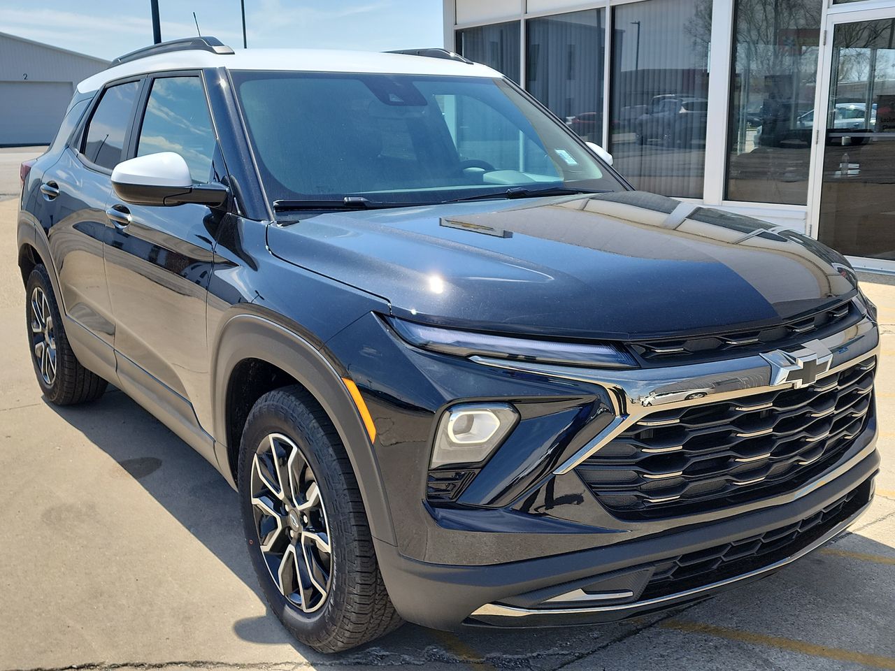 New 2025 Mosaic Black Metallic Chevrolet ACTIV image 1