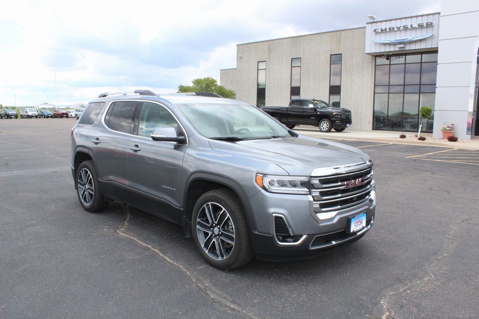 Used 2021 GMC Acadia SLT with VIN 1GKKNULS7MZ184681 for sale in Luverne, Minnesota