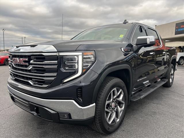 Used 2023 Titanium Rush Metallic GMC SLT image 1