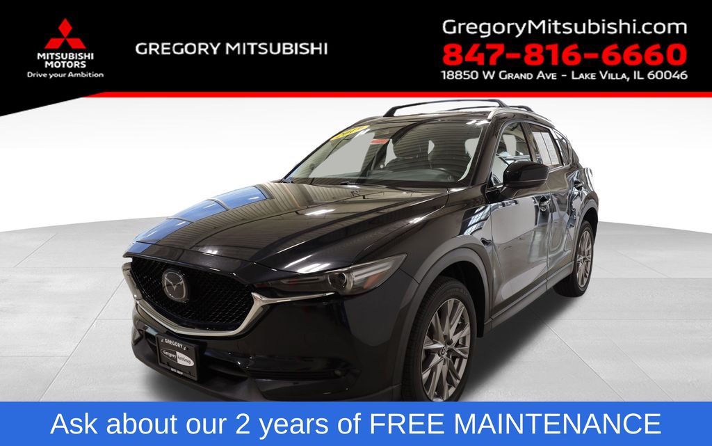 Used 2019 Black Mazda Grand Touring image 1