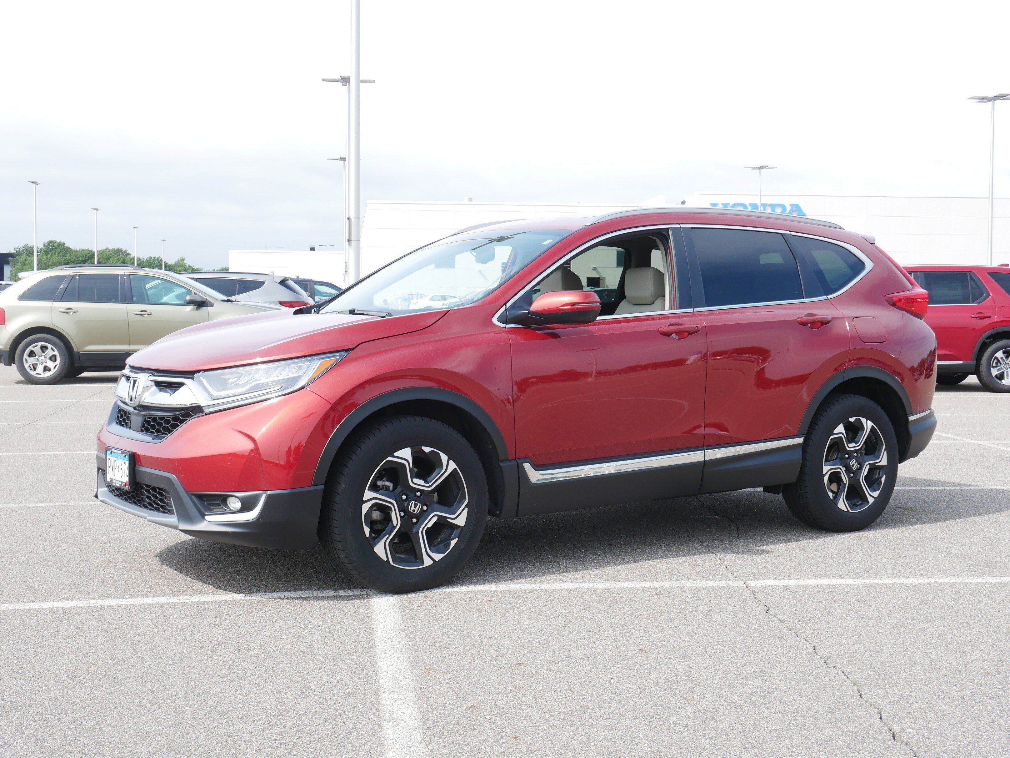 Used 2018 Honda CR-V Touring with VIN 2HKRW2H99JH618667 for sale in Waite Park, Minnesota