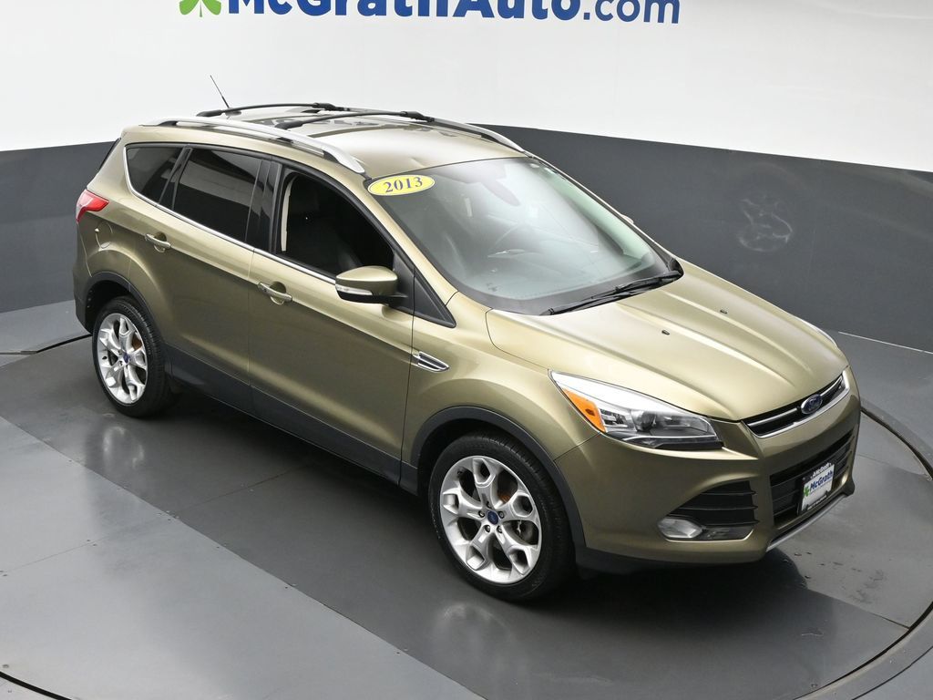 Used 2013 Ford Escape Titanium with VIN 1FMCU9J91DUA28001 for sale in Cedar Rapids, IA