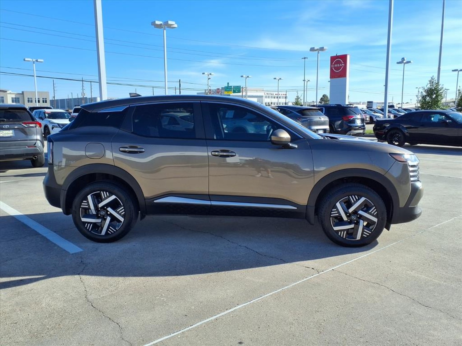 2025 Nissan Kicks SV Brown at Robbins Nissan