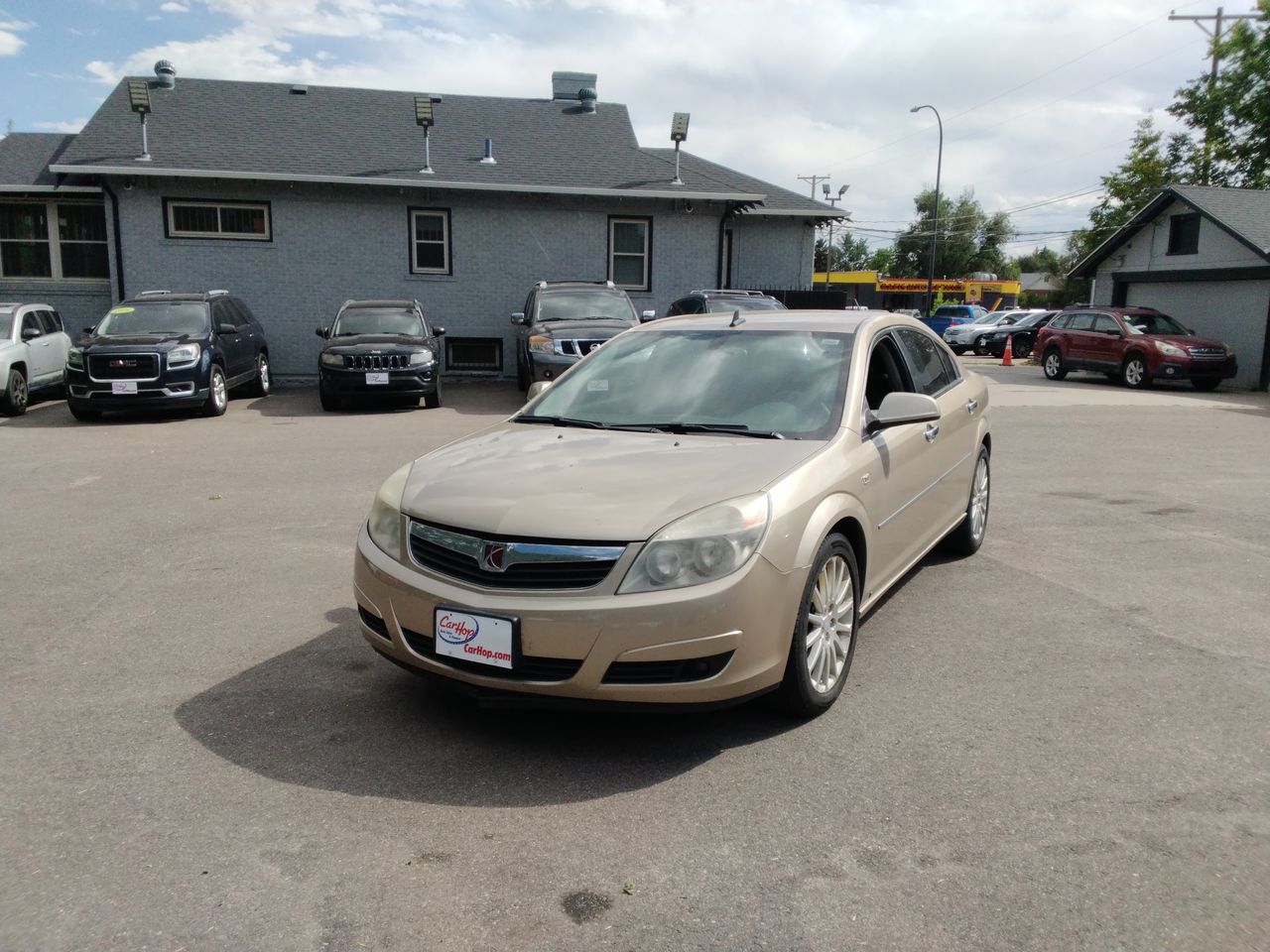 Used 2008 Gold Saturn XR image 1