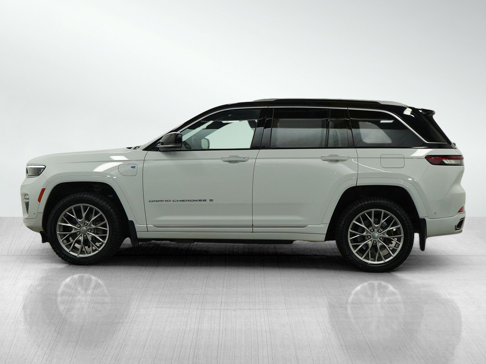 Used 2022 Jeep Grand Cherokee Summit Reserve 4xe with VIN 1C4RJYE62N8767079 for sale in Hopkins, Minnesota