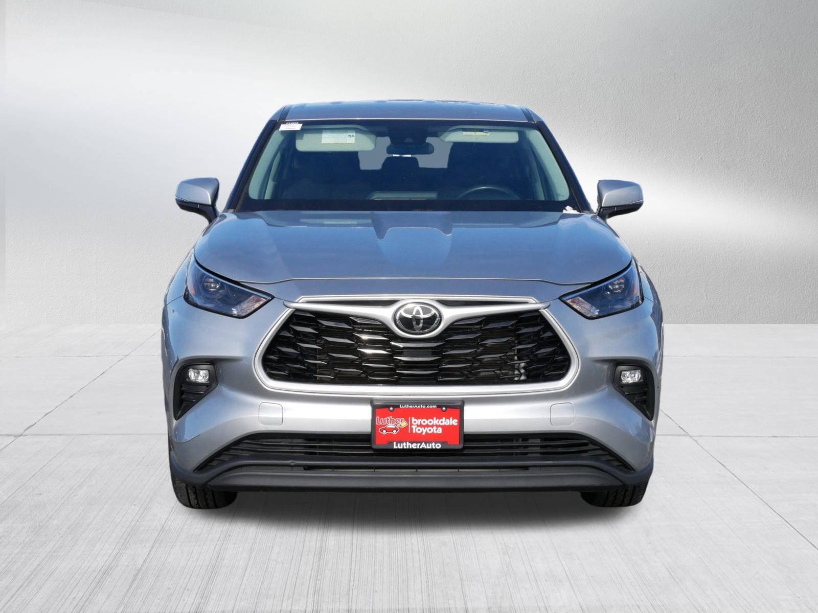 Certified 2022 Toyota Highlander LE with VIN 5TDBZRBH2NS253606 for sale in Brooklyn Center, Minnesota